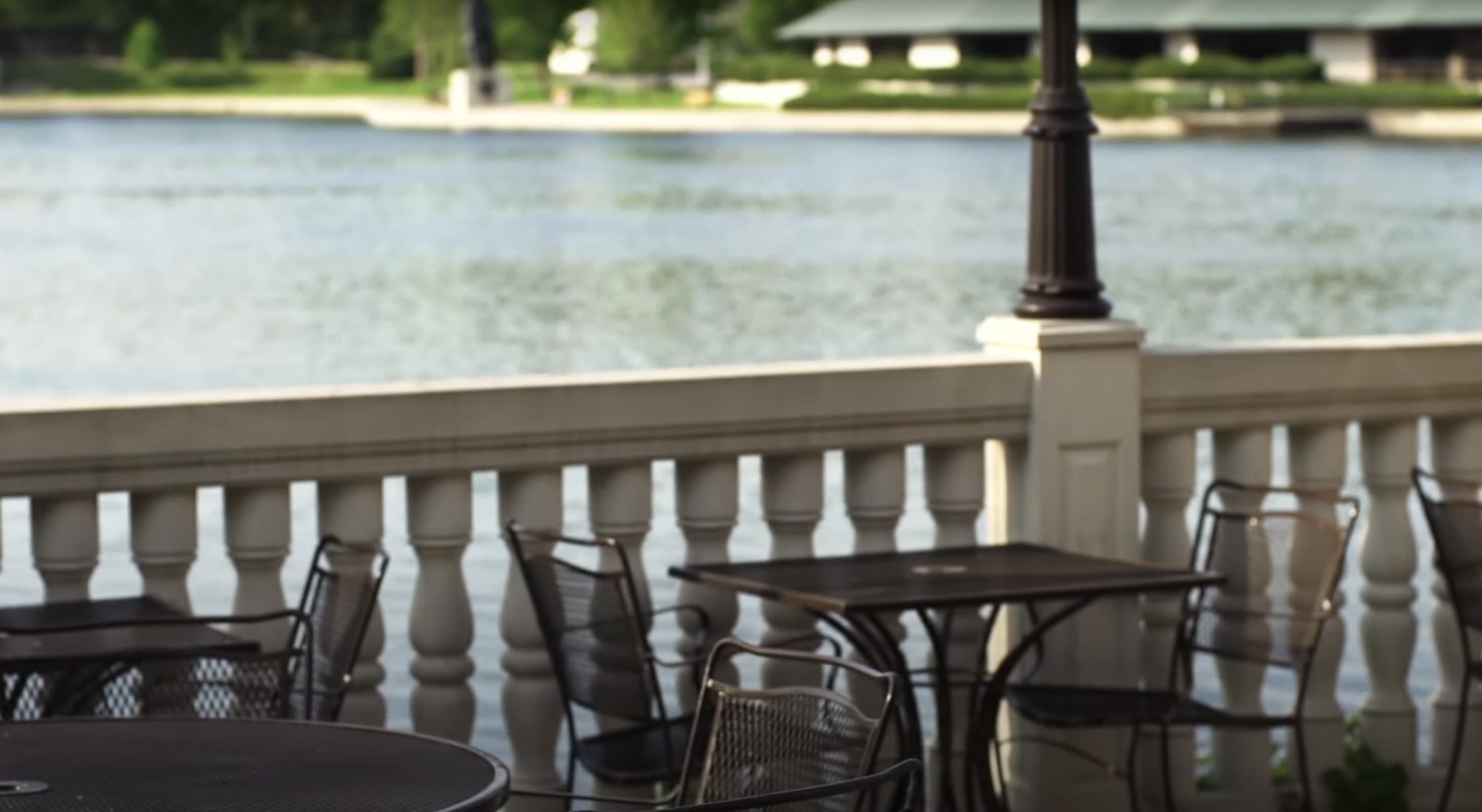 Outdoor patio seating along the Fox River at Hotel Baker in St. Charles, IL