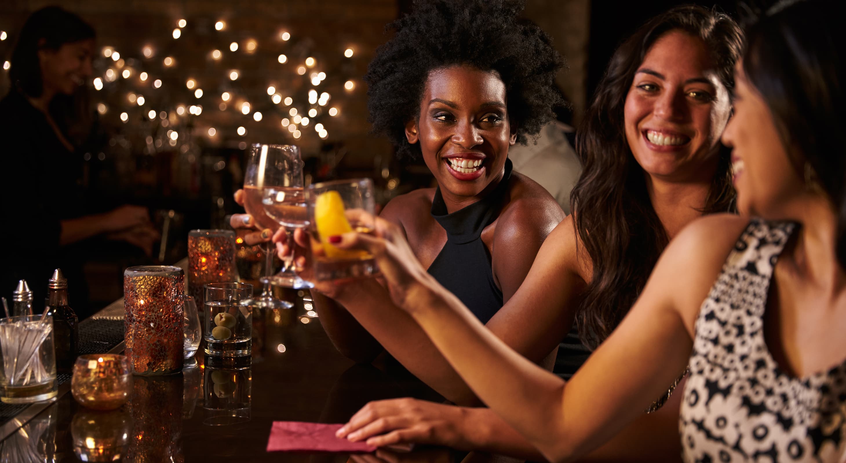 Group of female friends enjoying an evening at the wine & martini lounge near Chicago