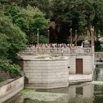 Wedding ceremony along the Fox River at the boathouse at St. Charles, IL inn