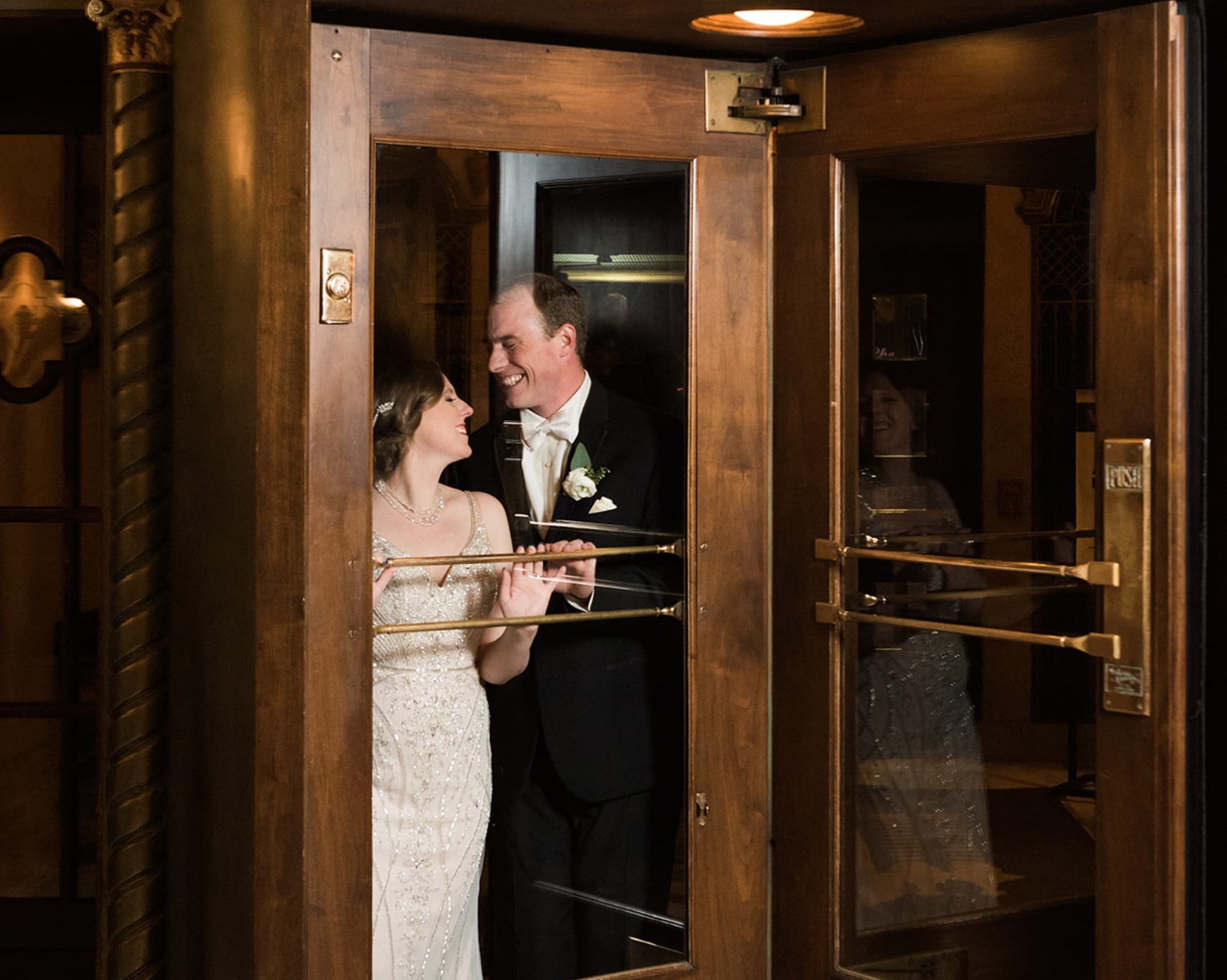 Bride and groom entering our St. Charles, IL inn