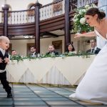 Bride dances with ring bearer in the Rainbow Room at St. Charles, IL inn
